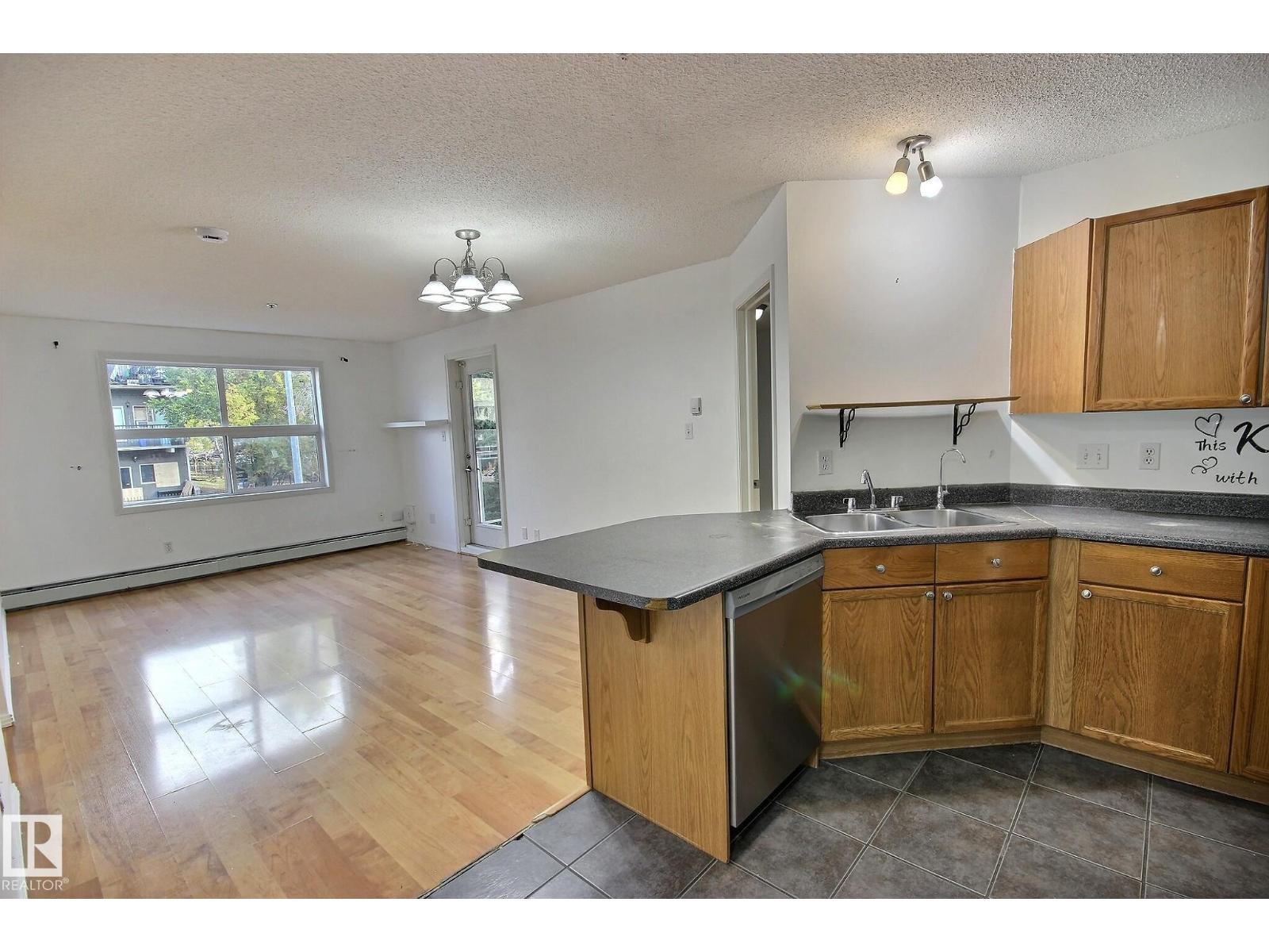 #218 12838 65 ST NW