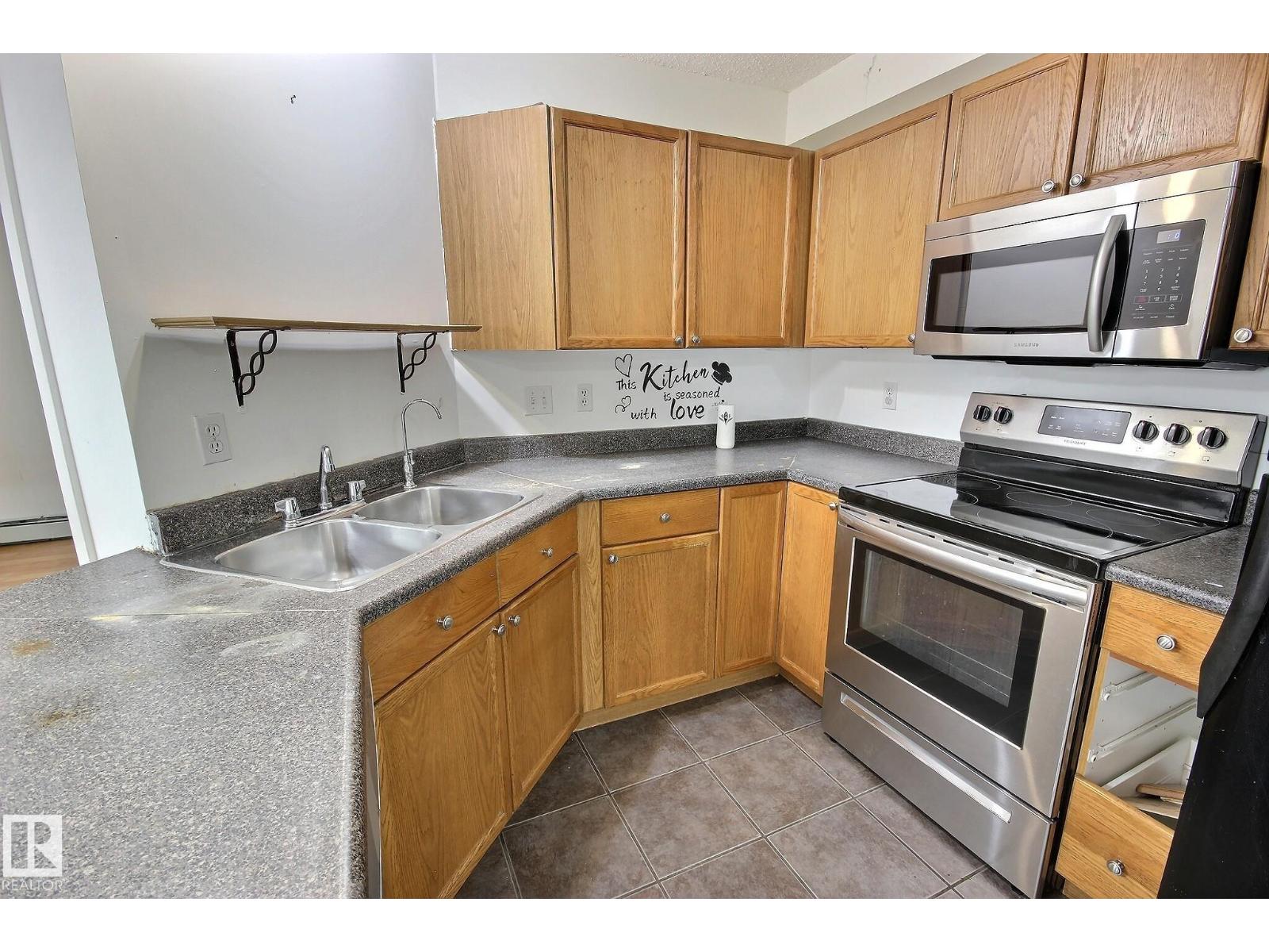 #218 12838 65 ST NW