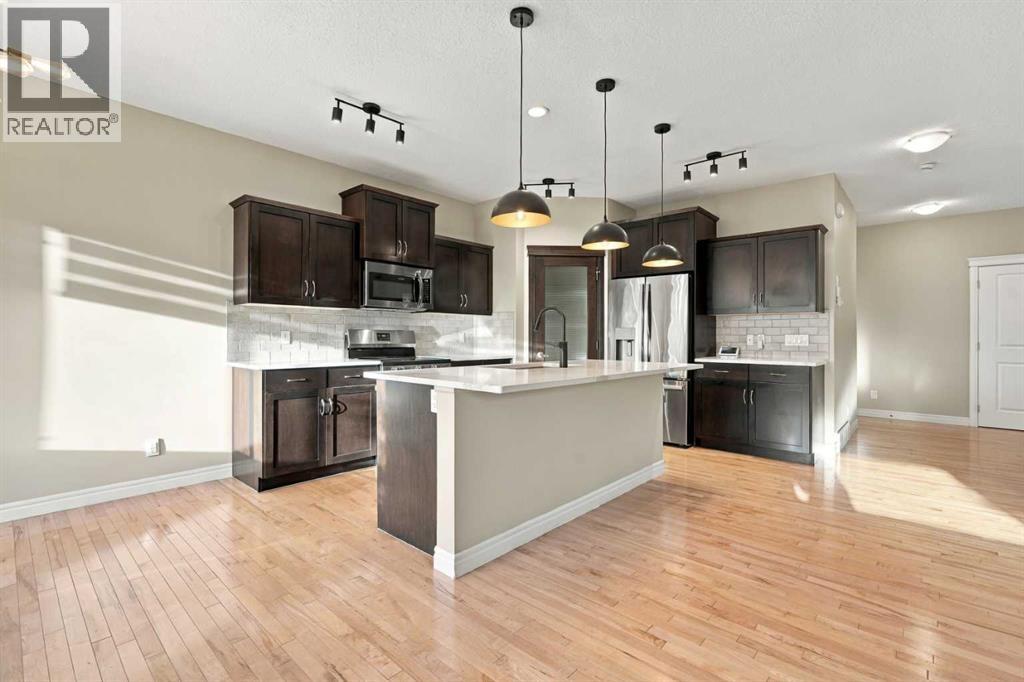 101 Cimarron Vista Crescent, Okotoks, Alberta T1S 0K2 - Photo 7 - A2347610