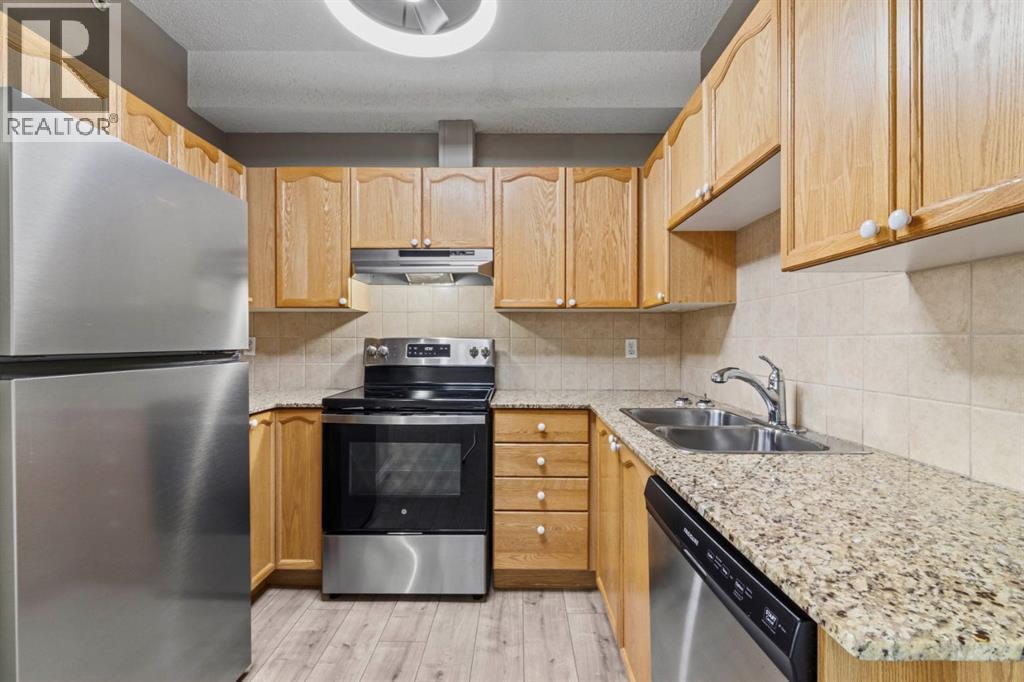 409, 8 Prestwick Pond Terrace SE, Calgary, Alberta  T2Z 4P3 - Photo 8 - A2350919