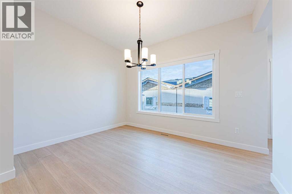 2 Fireside Common, Cochrane, Alberta  T4C 3E1 - Photo 5 - A2351162