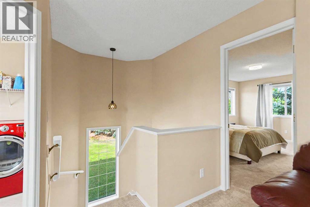 436 Rocky Ridge Bay NW, Calgary, Alberta  T3G 4H8 - Photo 13 - A2351708