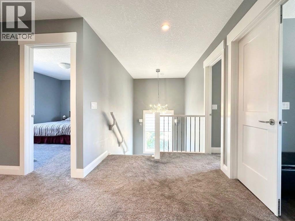 116 Kinniburgh Boulevard, Chestermere, Alberta  T1X 0M1 - Photo 18 - A2352561