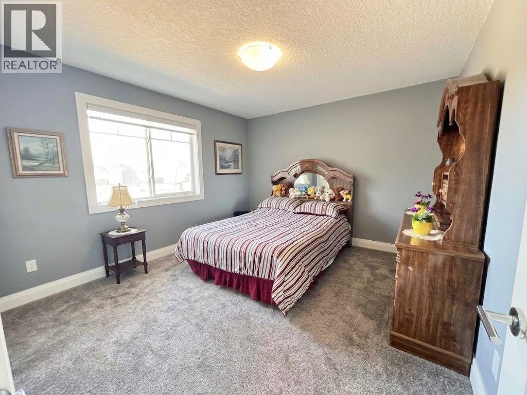 116 Kinniburgh Boulevard, Chestermere, Alberta  T1X 0M1 - Photo 27 - A2352561