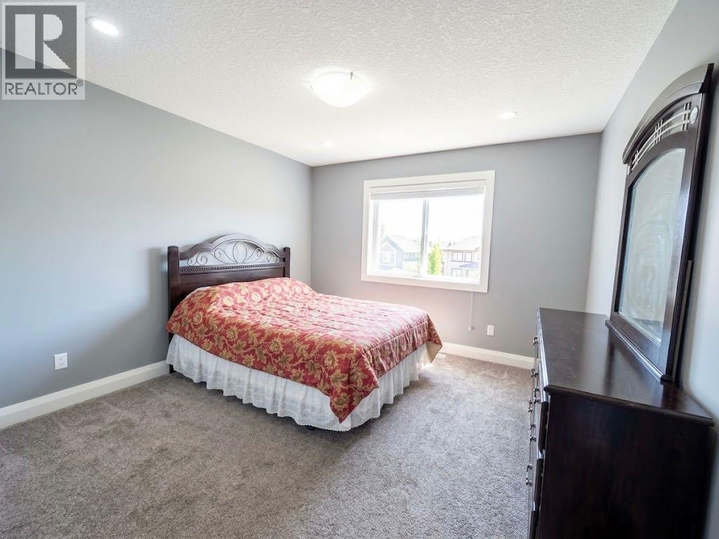 116 Kinniburgh Boulevard, Chestermere, Alberta  T1X 0M1 - Photo 28 - A2352561
