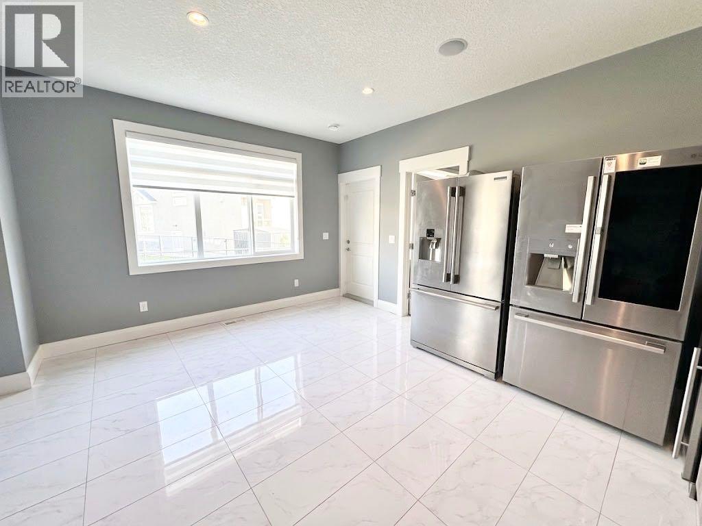 116 Kinniburgh Boulevard, Chestermere, Alberta  T1X 0M1 - Photo 31 - A2352561