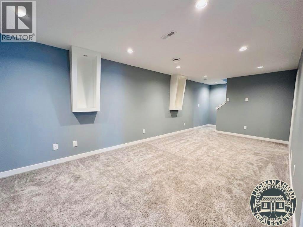 116 Kinniburgh Boulevard, Chestermere, Alberta  T1X 0M1 - Photo 37 - A2352561
