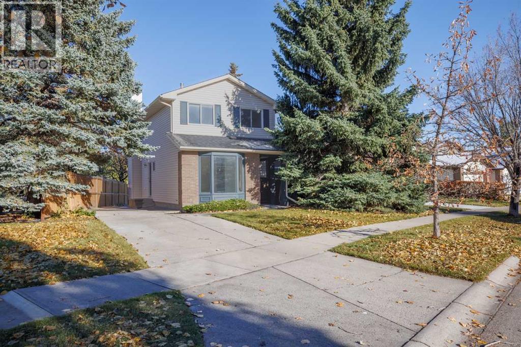 383 Woodfield Road SW, Calgary, Alberta  T2W 3V8 - Photo 2 - A2351742