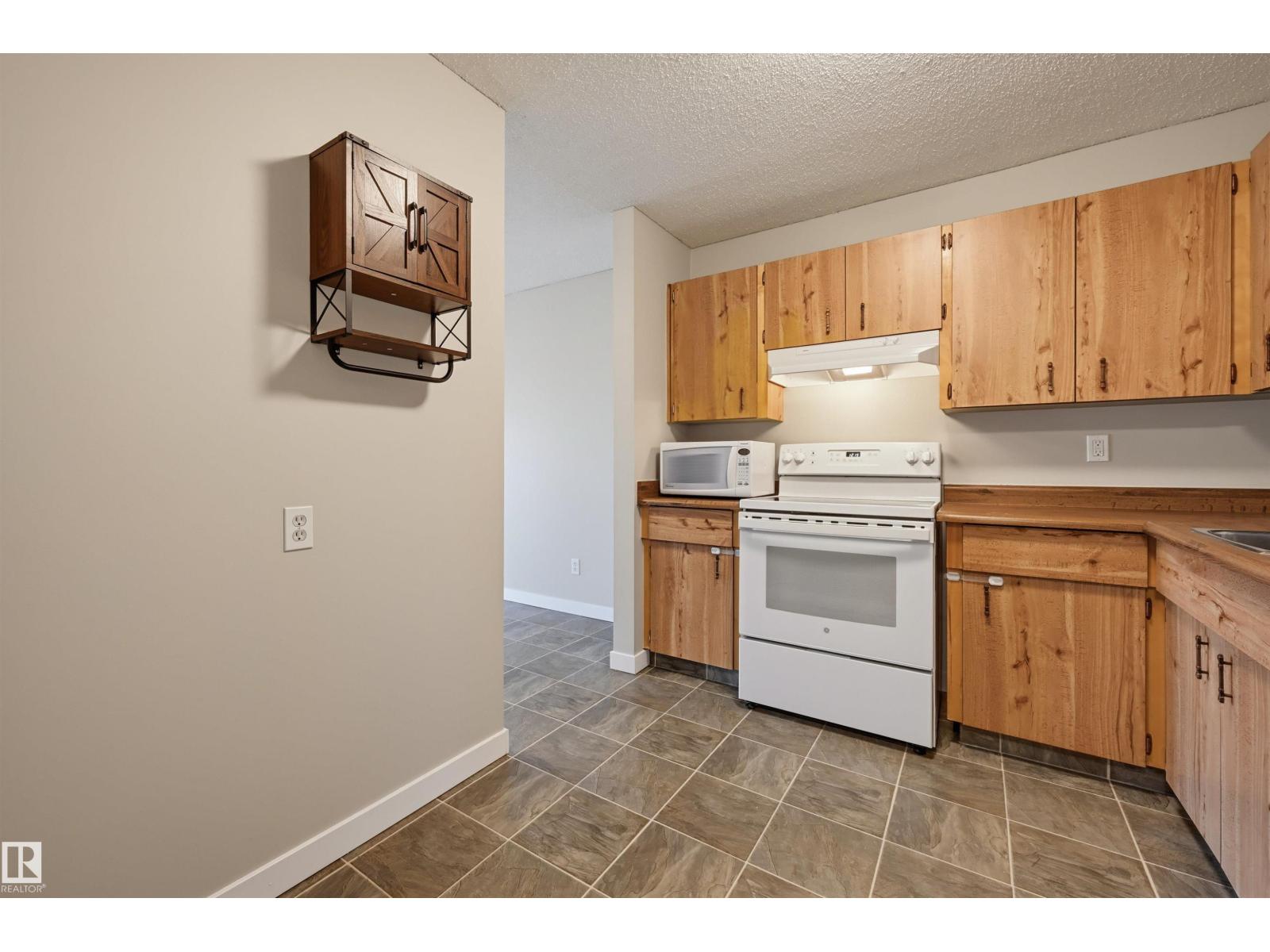 #408 17820 98 AV NW