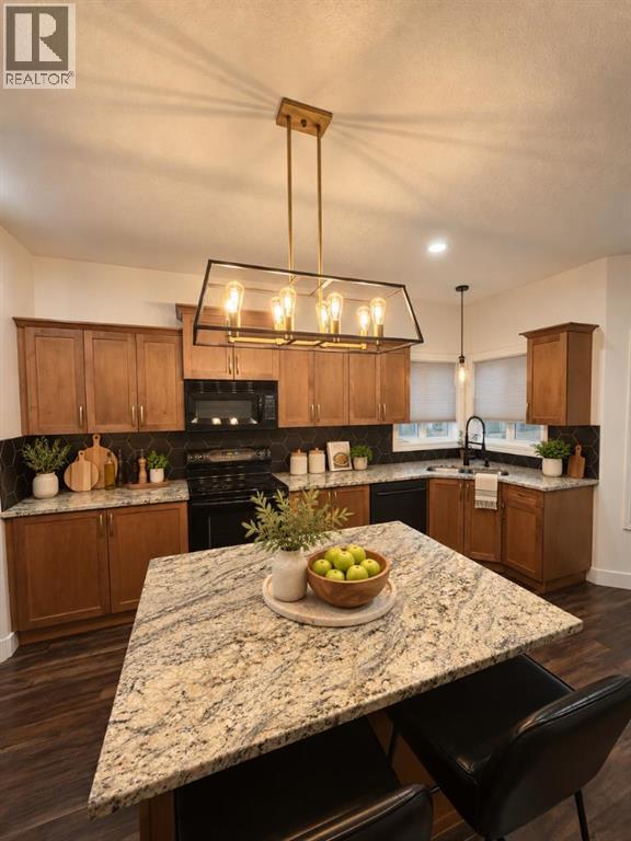 112 Aspen Creek Crescent
