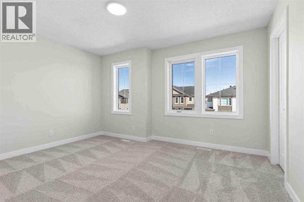 76 Southborough Lane, Cochrane, Alberta  T4C 3J5 - Photo 38 - A2344772