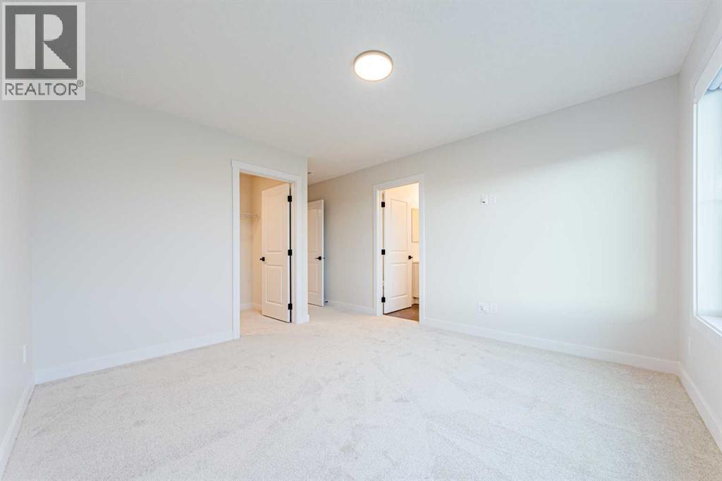 2 Fireside Common, Cochrane, Alberta  T4C 3E1 - Photo 7 - A2351162