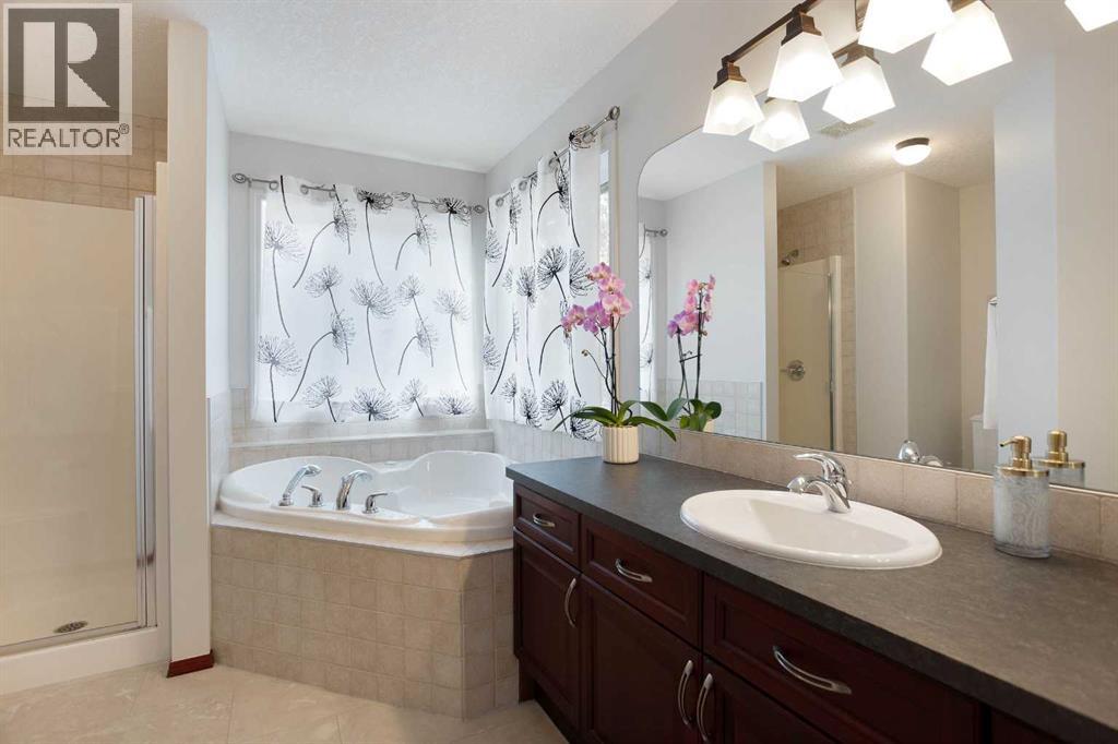 66 Cougarstone Close SW, Calgary, Alberta  T3H 5J4 - Photo 24 - A2348223