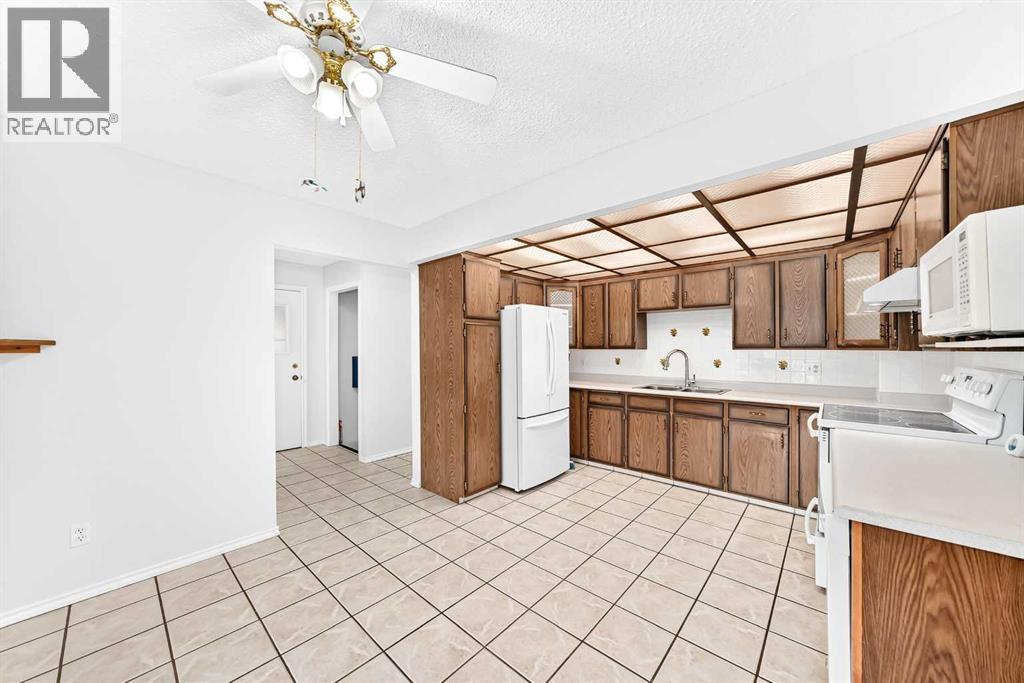 31 Ranchero Bay NW, Calgary, Alberta  T3G 1B6 - Photo 14 - A2315759