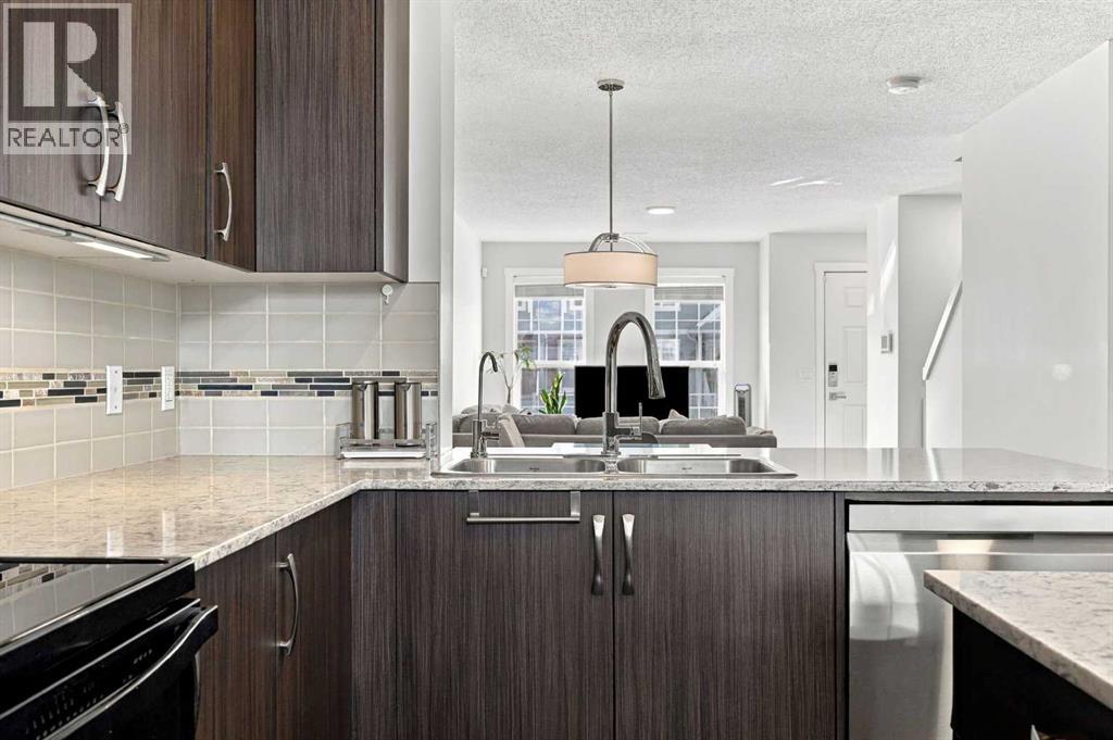 520 Auburn Bay Circle SE, Calgary, Alberta  T3M 2A3 - Photo 12 - A2348703