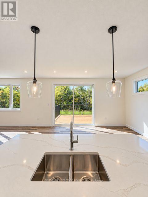 134 Aspen Parkway W, Aylmer, Ontario  N5H 3H7 - Photo 4 - X13557410