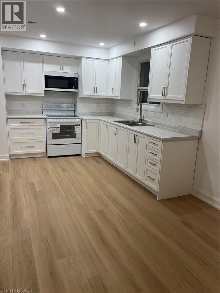42 Woodman Drive S Unit# Upper, Hamilton, Ontario  L8K 4E4 - Photo 6 - 40867937