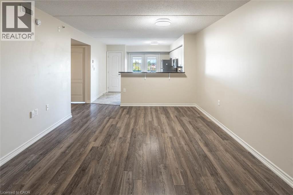 1460 Main Street E Unit# 309, Milton, Ontario  L9T 8W5 - Photo 3 - 40869822