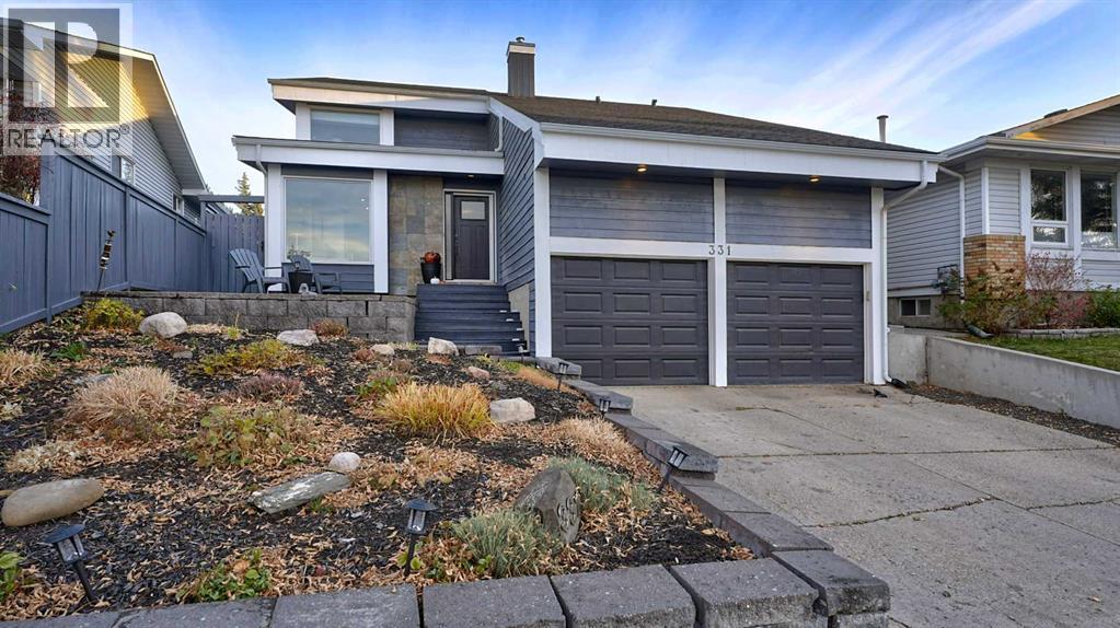 331 Woodbine Boulevard SW, Calgary, Alberta  T2W 4K8 - Photo 1 - A2352149