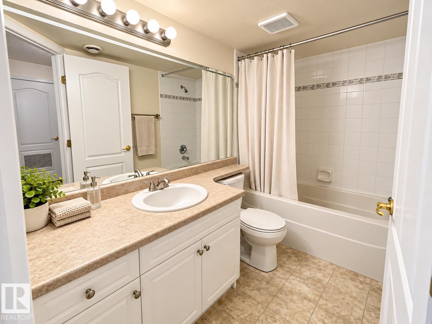 #402 8909 100 ST NW