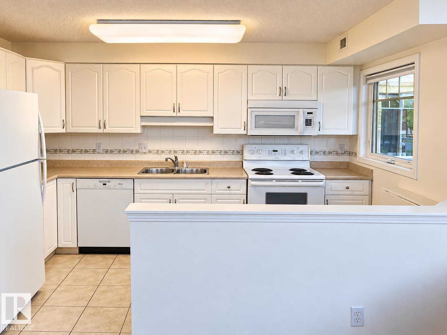#402 8909 100 ST NW