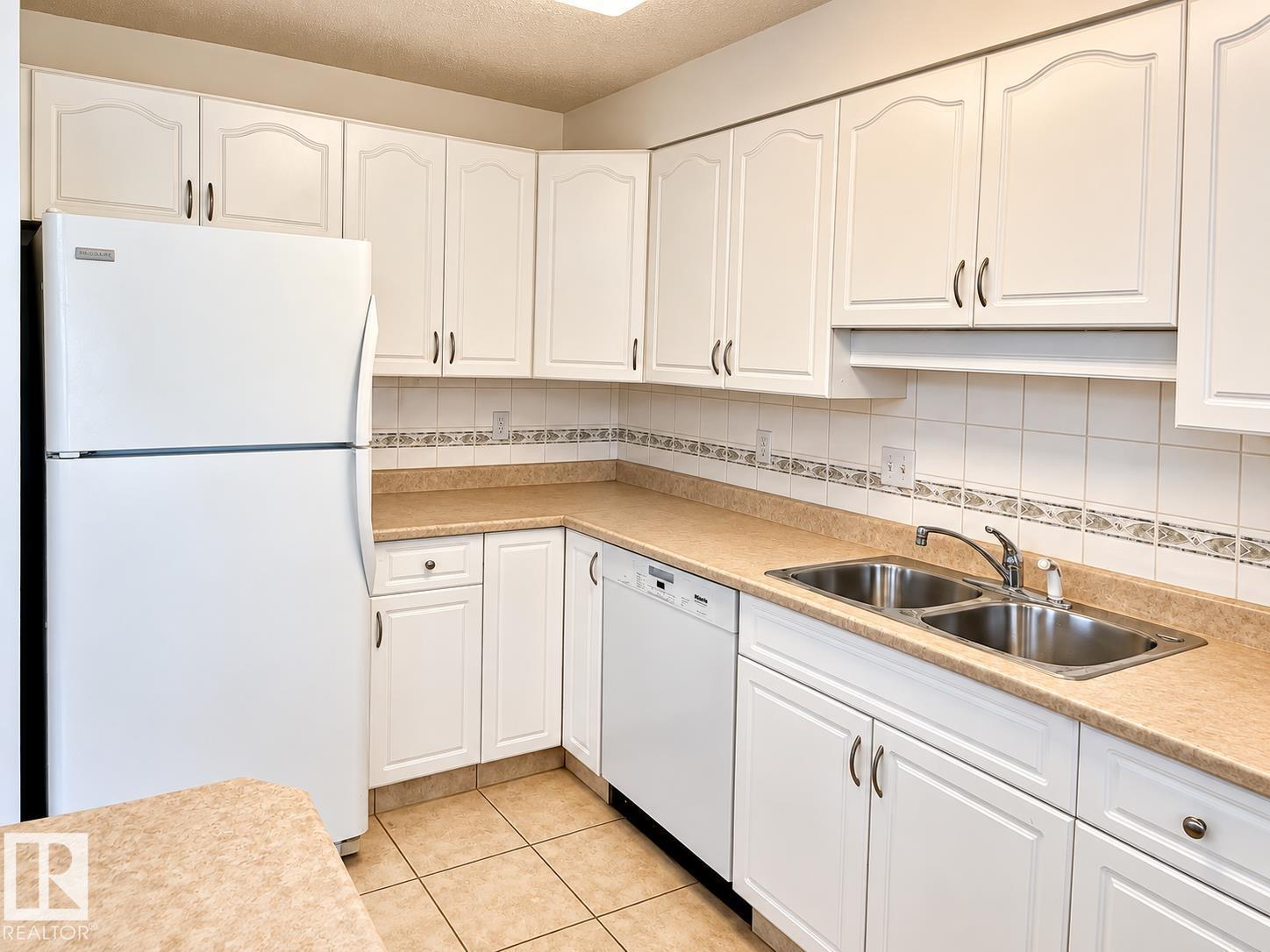 #402 8909 100 ST NW