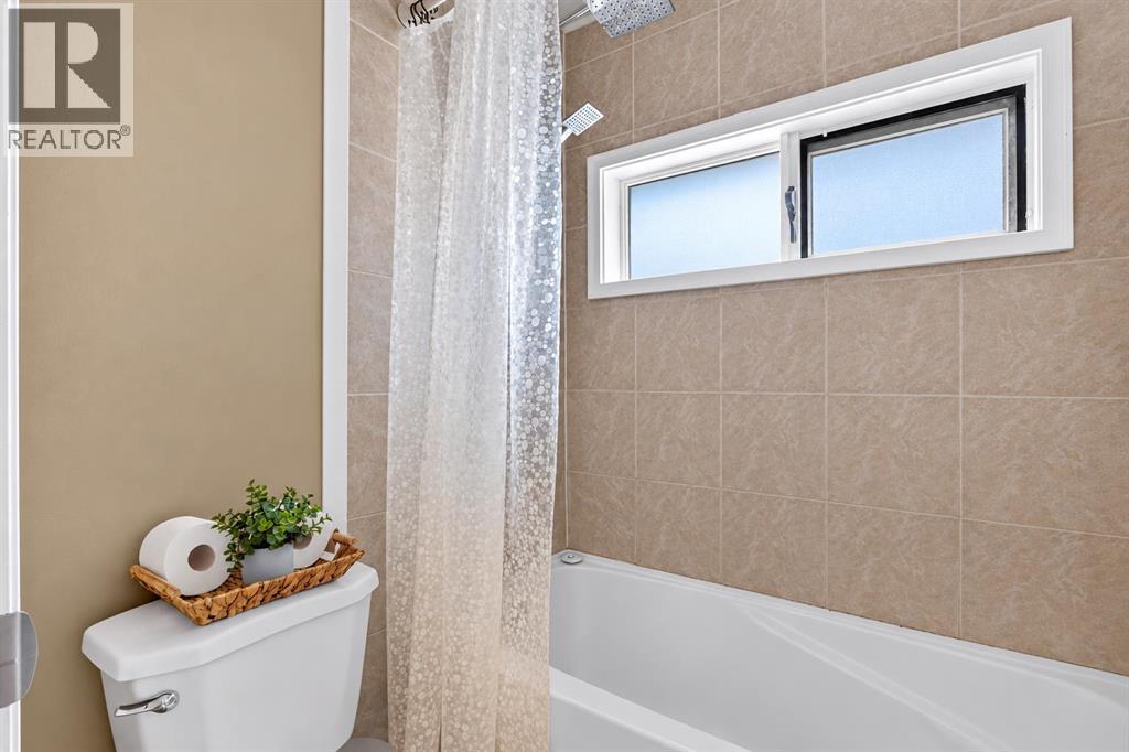 52 Cedargrove Way SW, Calgary, Alberta  T2W 4V2 - Photo 21 - A2351881