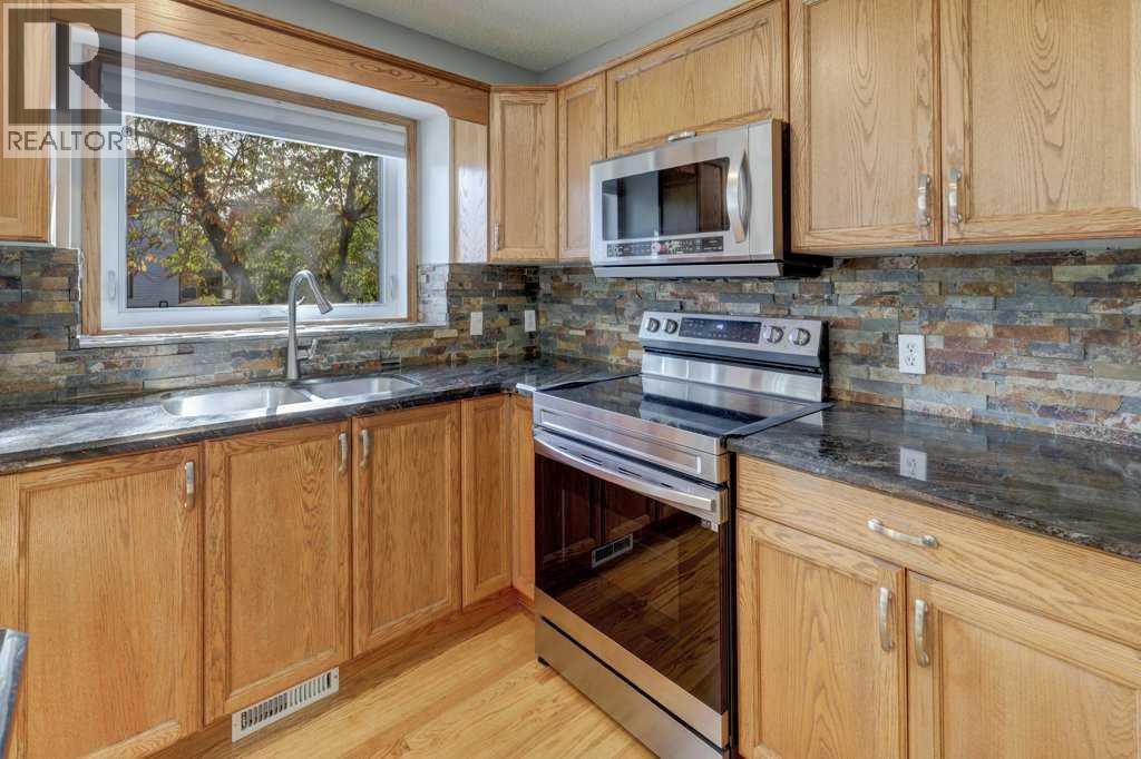 212 Riverview Close SE, Calgary, Alberta  T2C 4G7 - Photo 6 - A2352536