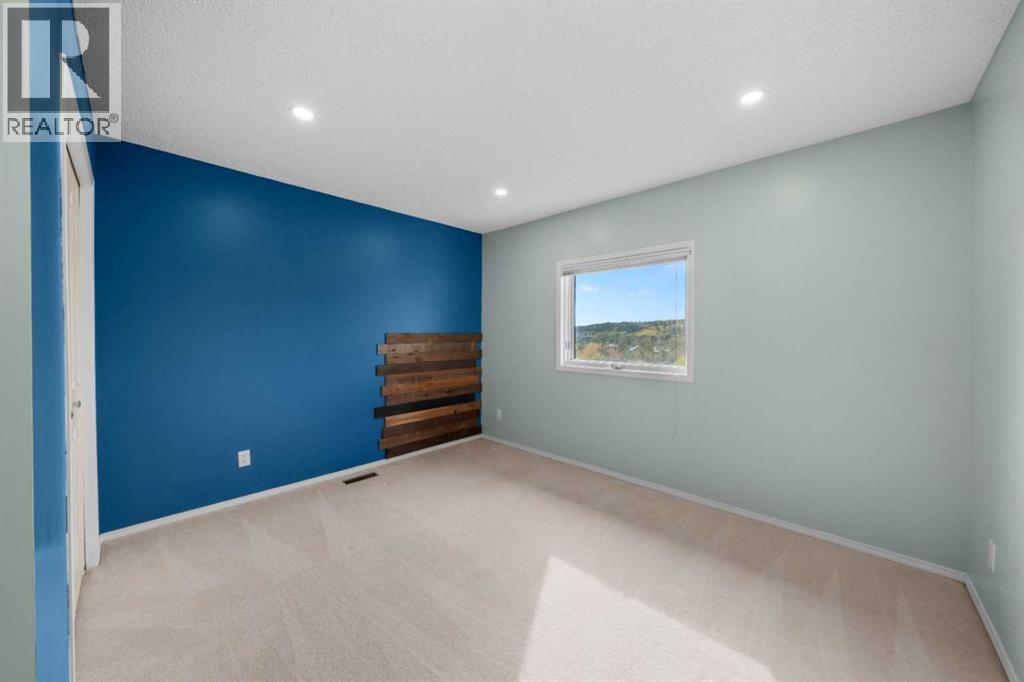 52 West Mitford Crescent, Cochrane, Alberta  T4C 1L2 - Photo 18 - A2350443