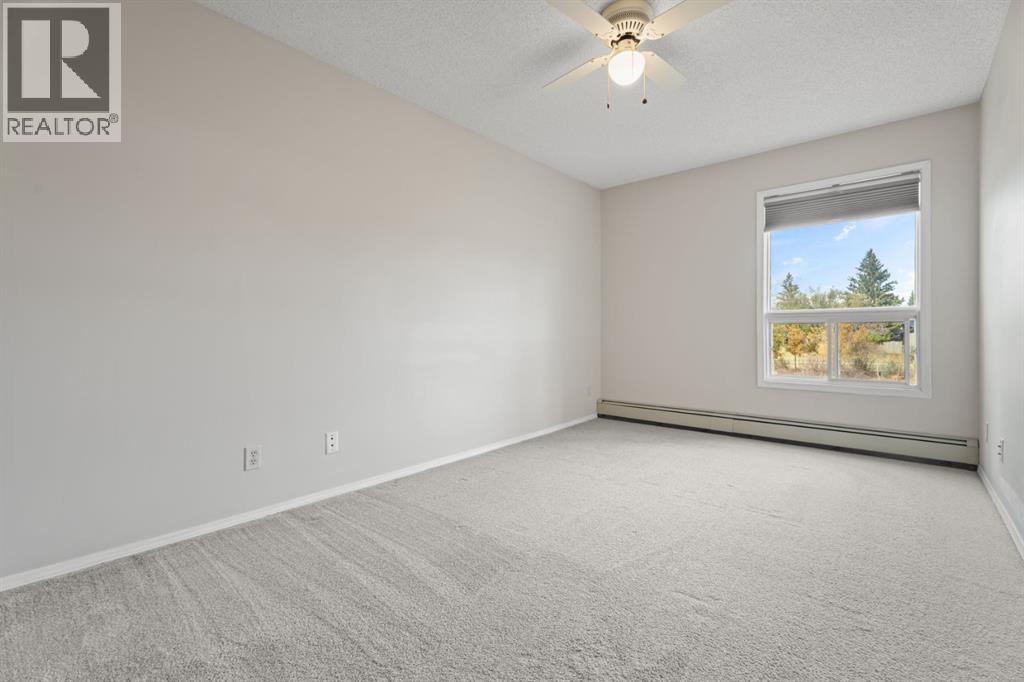210, 102 Centre Court, Okotoks, Alberta  T1S 1Z7 - Photo 18 - A2352643