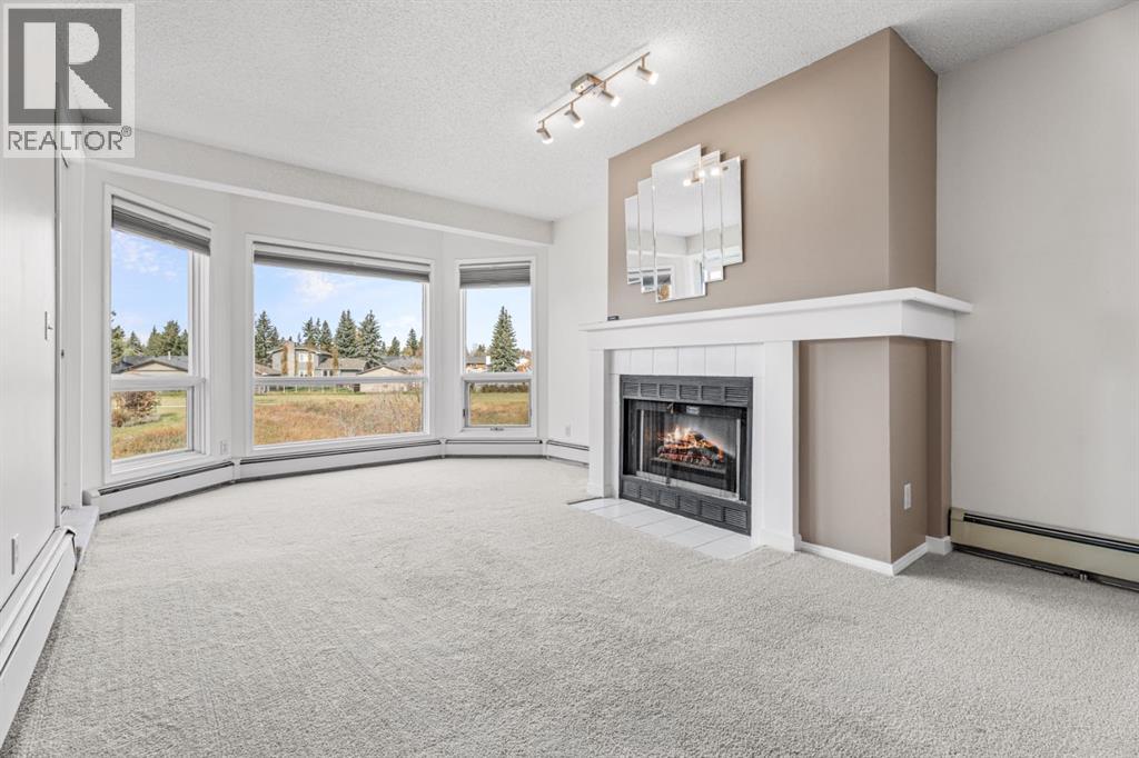210, 102 Centre Court, Okotoks, Alberta  T1S 1Z7 - Photo 7 - A2352643