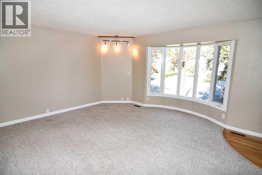 248 Bracewood Road SW, Calgary, Alberta  T2W 3C1 - Photo 6 - A2350192