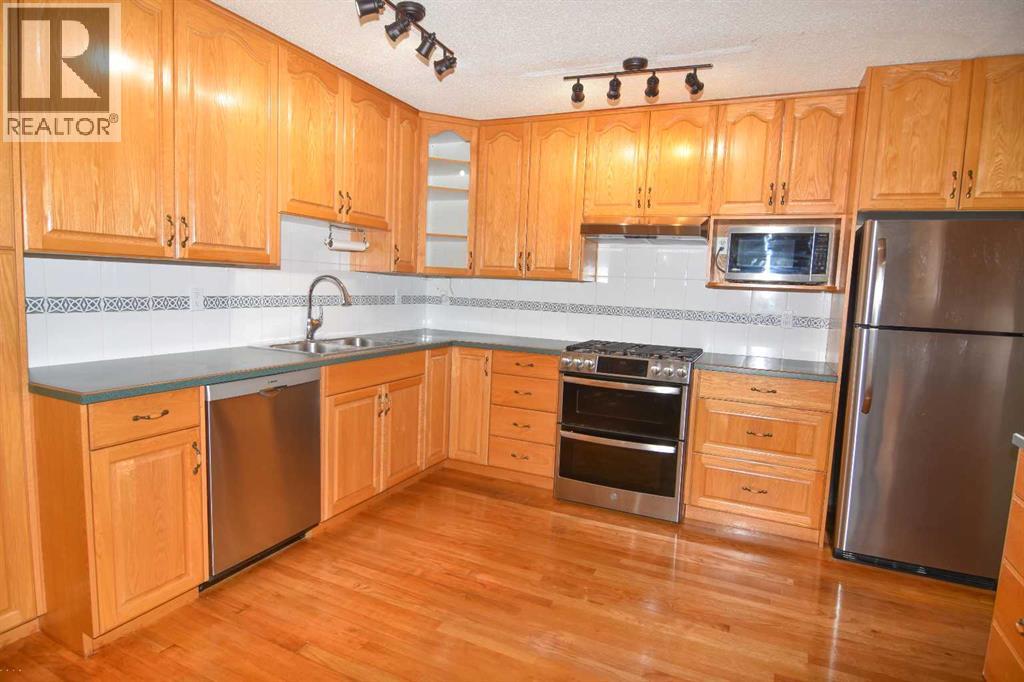248 Bracewood Road SW, Calgary, Alberta  T2W 3C1 - Photo 8 - A2350192