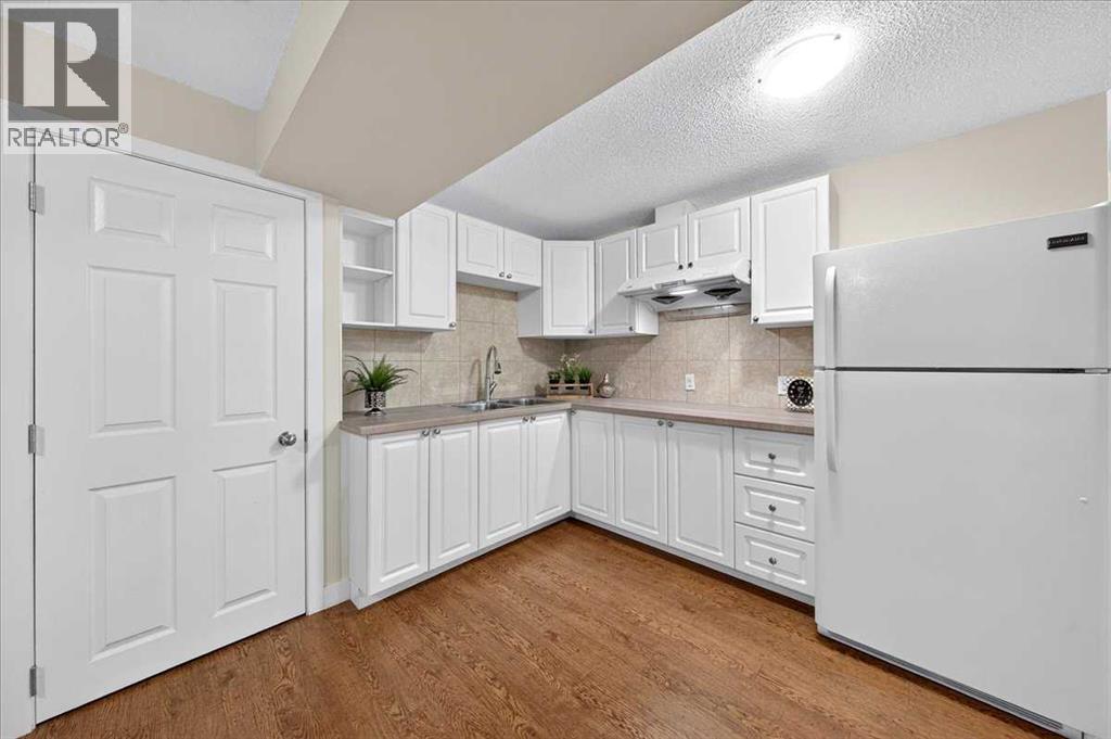 117 Panora Way NW, Calgary, Alberta  T3K 0R4 - Photo 30 - A2351873