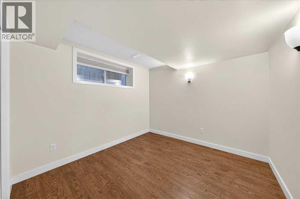 117 Panora Way NW, Calgary, Alberta  T3K 0R4 - Photo 33 - A2351873