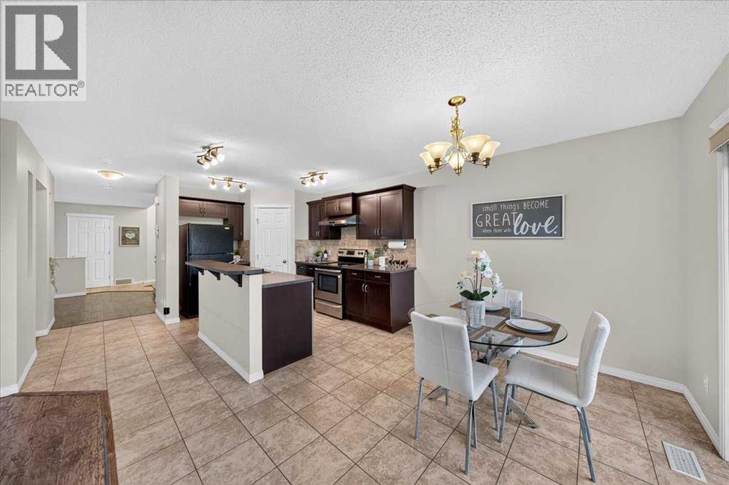 117 Panora Way NW, Calgary, Alberta  T3K 0R4 - Photo 8 - A2351873