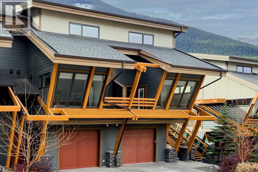 404, 105 Stewart Creek Rise Sw, Canmore, Alberta  T1W 0J5 - Photo 1 - A2352421