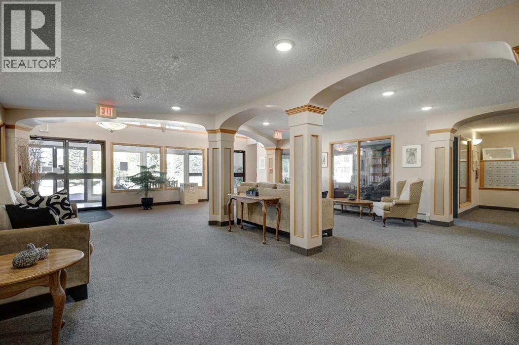 220, 7229 Sierra Morena Boulevard SW, Calgary, Alberta  T3H 3L8 - Photo 38 - A2345945