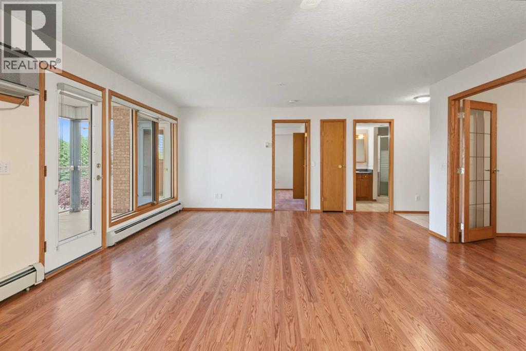 220, 7229 Sierra Morena Boulevard SW, Calgary, Alberta  T3H 3L8 - Photo 6 - A2345945