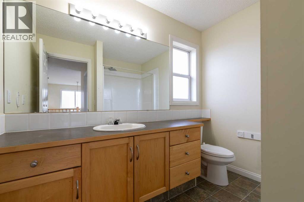 151 Bow Ridge Crescent, Cochrane, Alberta  T4C 1V2 - Photo 23 - A2351846