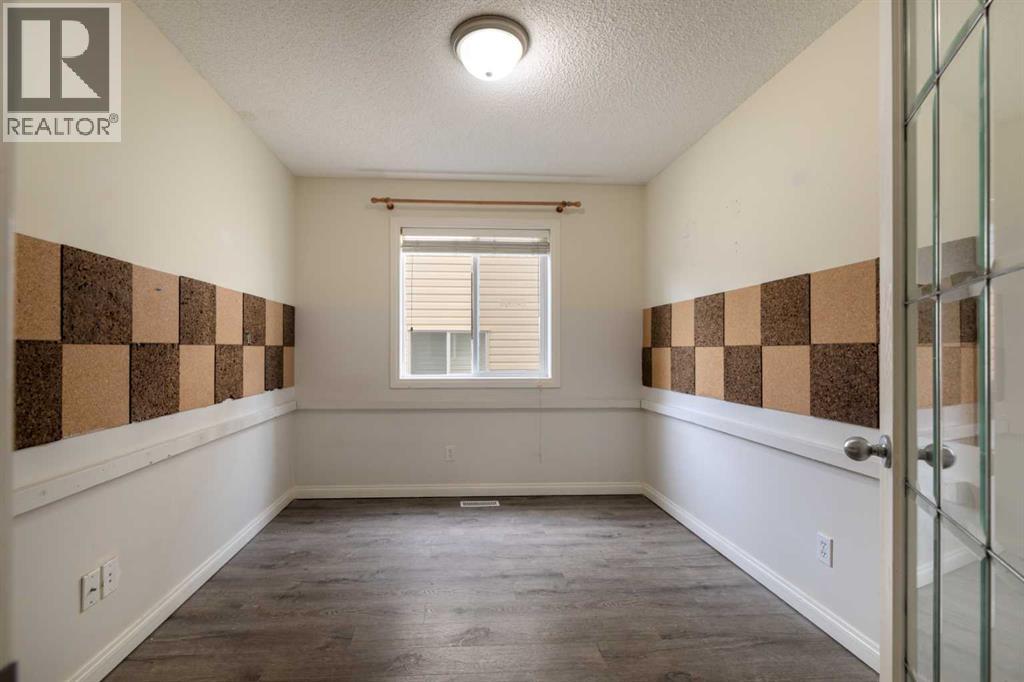 151 Bow Ridge Crescent, Cochrane, Alberta  T4C 1V2 - Photo 11 - A2351846
