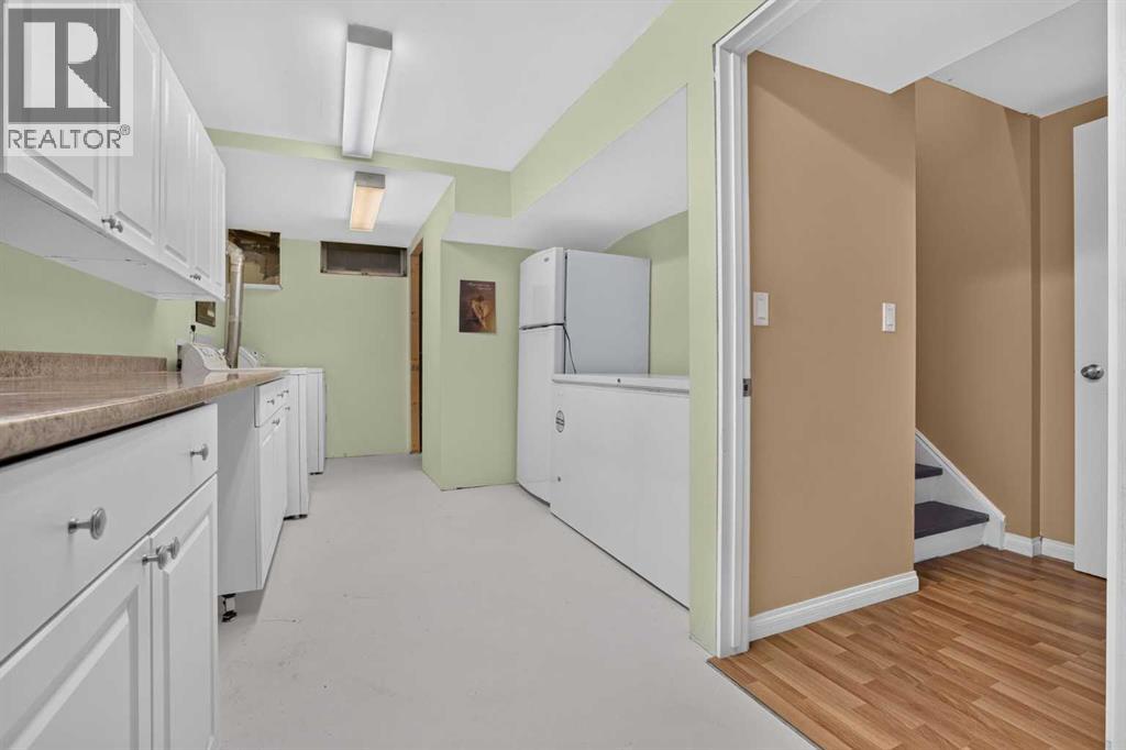 172 Queensland Road SE, Calgary, Alberta  T2J 3S2 - Photo 32 - A2333562