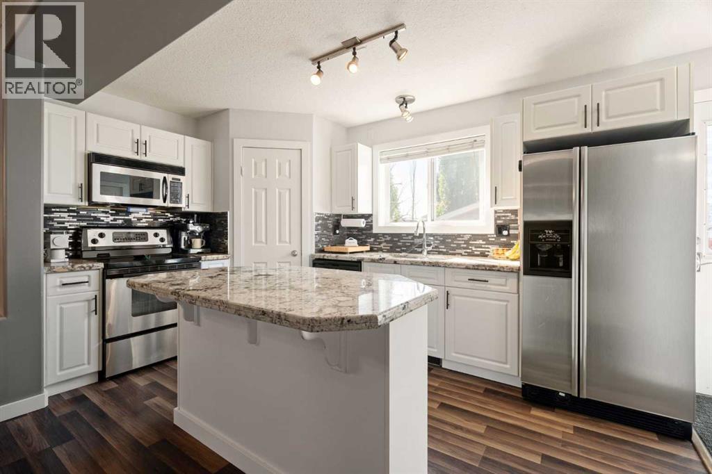 310 Coventry Road NE, Calgary, Alberta  T3K 5K5 - Photo 10 - A2351918
