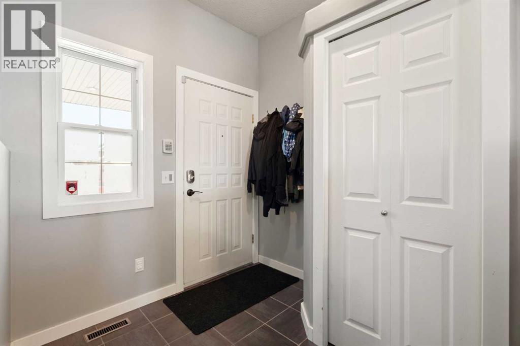 310 Coventry Road NE, Calgary, Alberta  T3K 5K5 - Photo 5 - A2351918