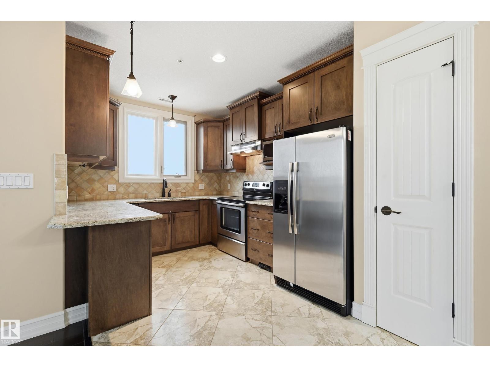 #909 10142 111 ST NW