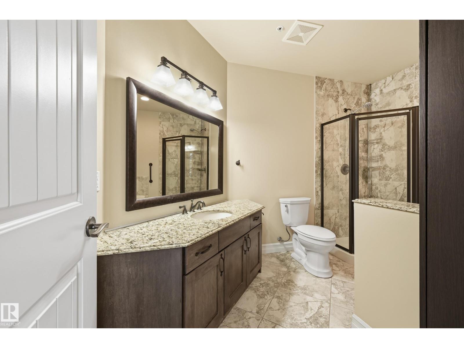 #909 10142 111 ST NW