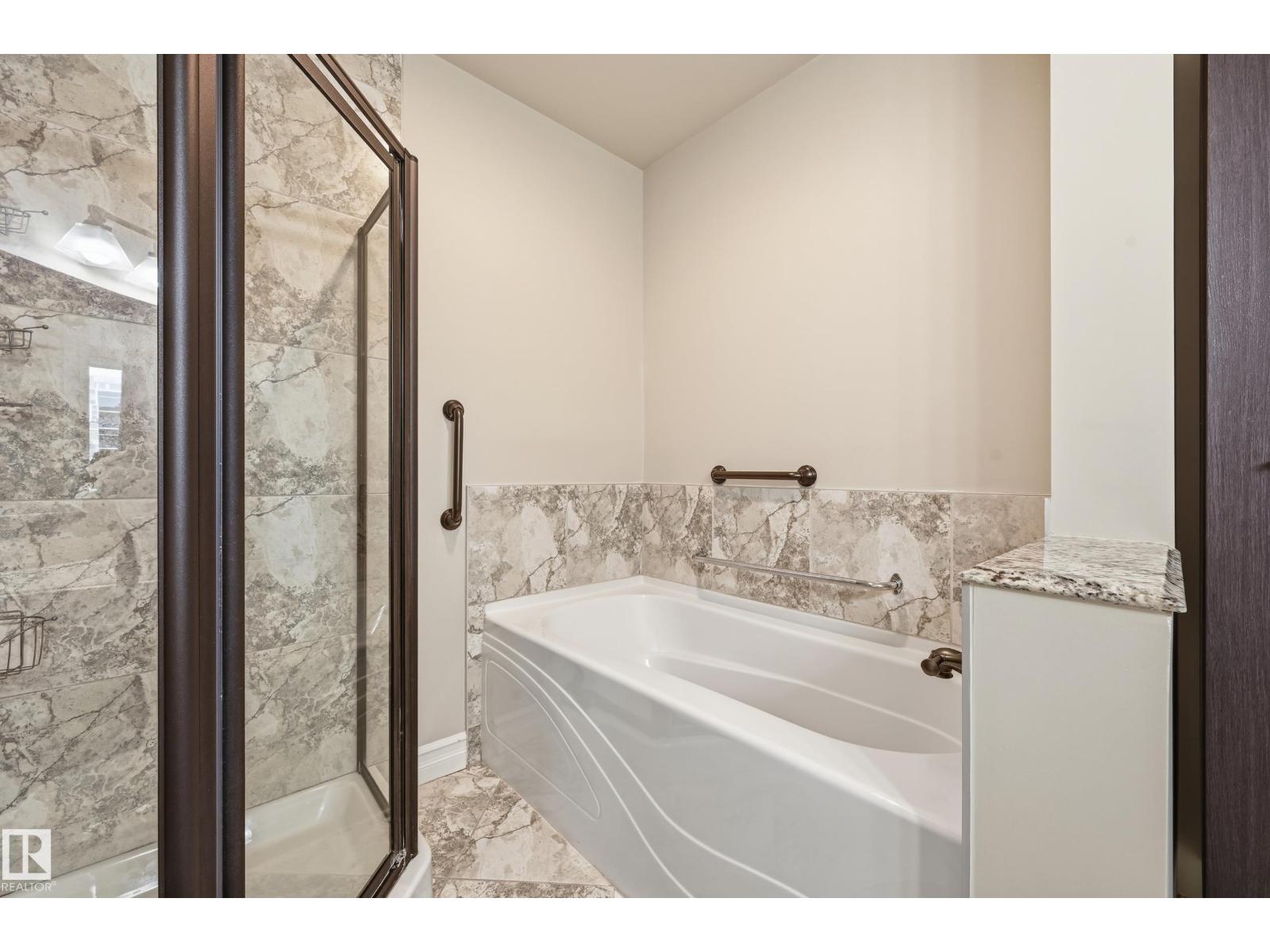 #909 10142 111 ST NW