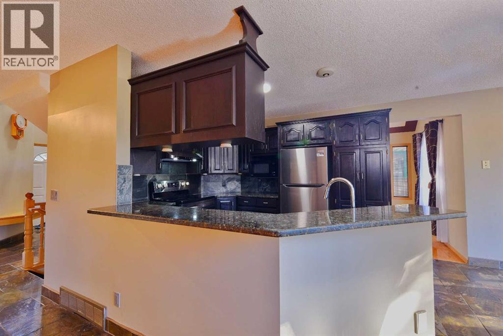 131 Hawkstone Drive NW, Calgary, Alberta  T3G 3N4 - Photo 5 - A2345692
