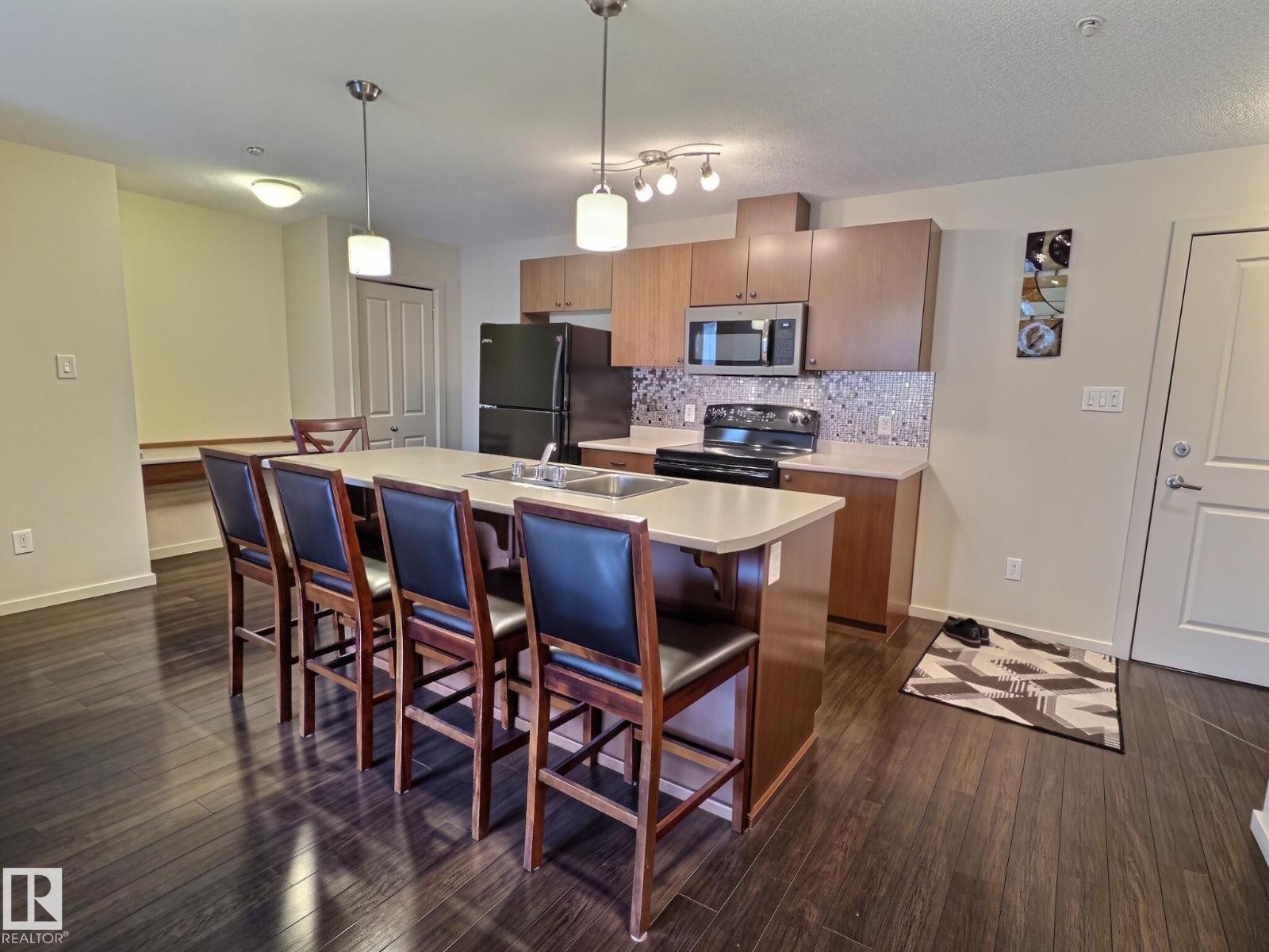 #106 508 Albany WY NW