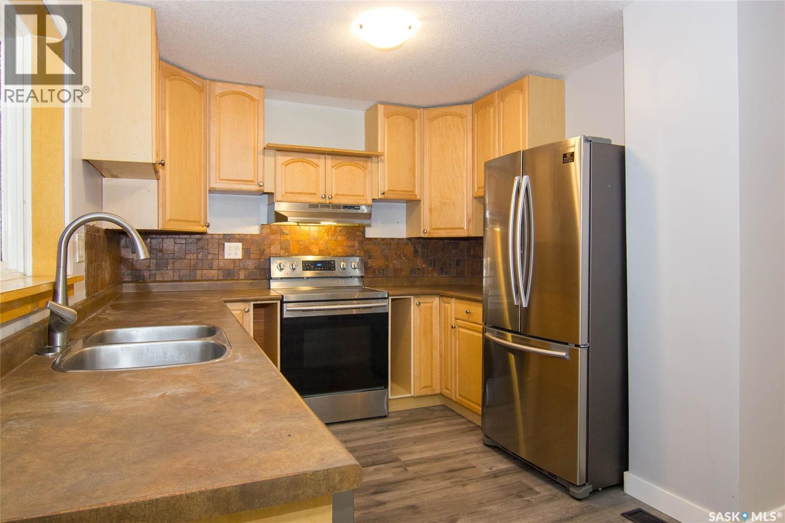 308 Hilliard Street E, Saskatoon, Saskatchewan  S7J 0E6 - Photo 3 - SK051332
